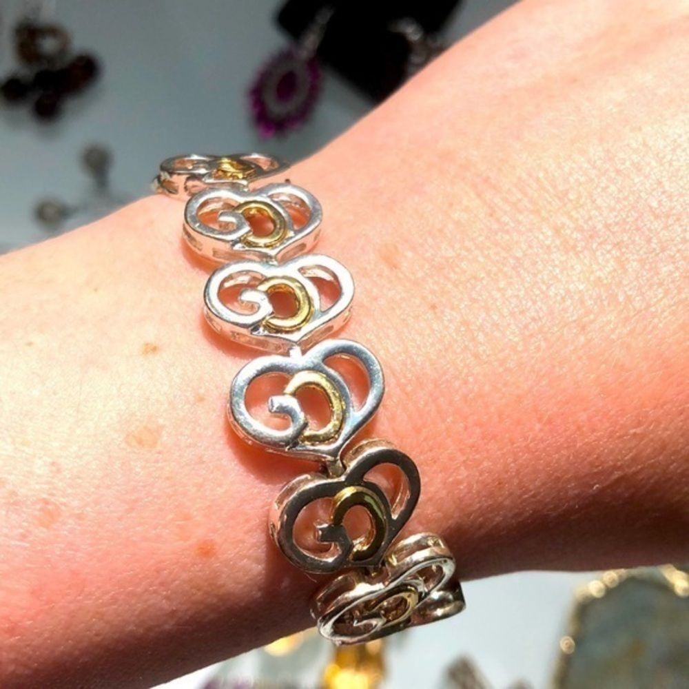 Silver and gold toned heart bracelet